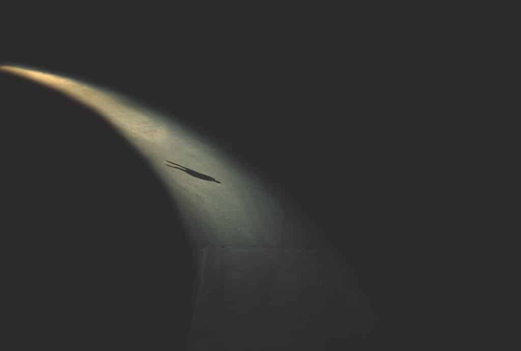 man walking in the night