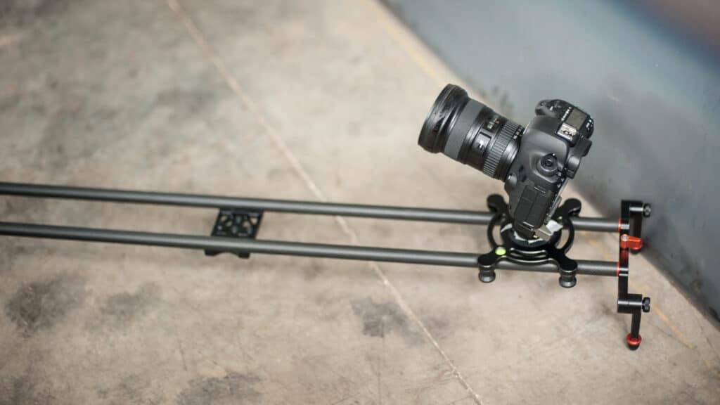 DSLR camera on mini table desktop rail wheel system