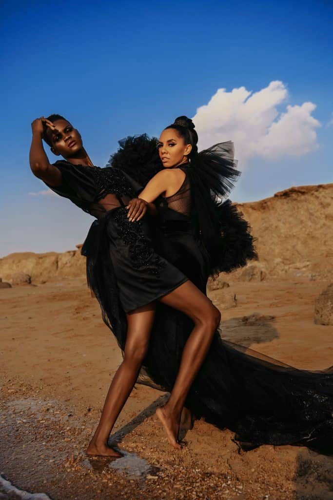 Two women in black dresses