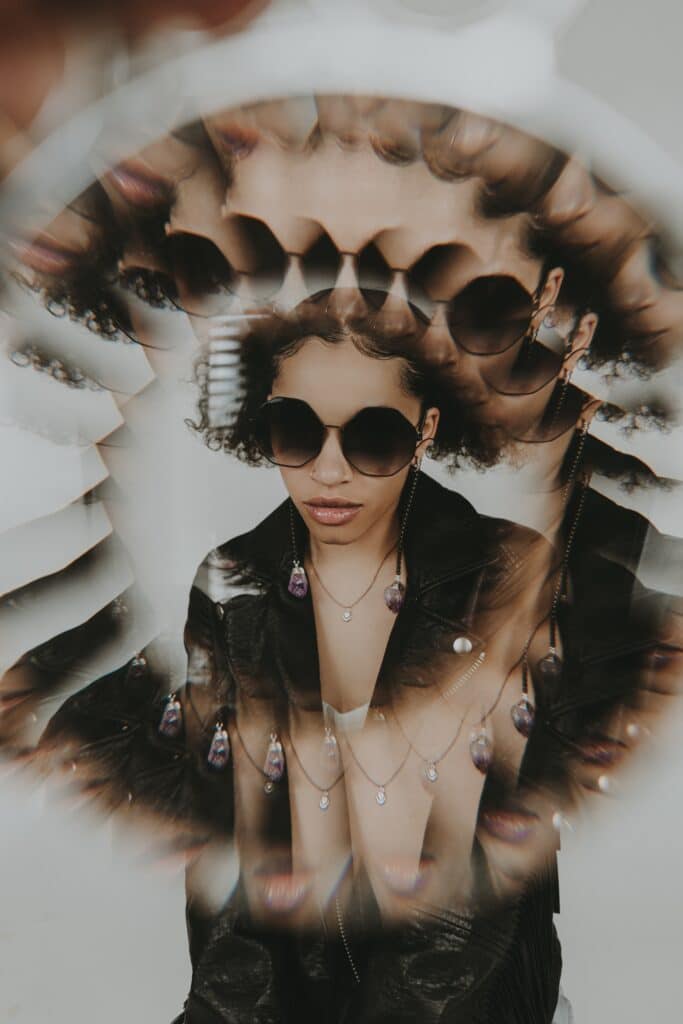 abstract kaleidoscope image of woman wearing sunglasses