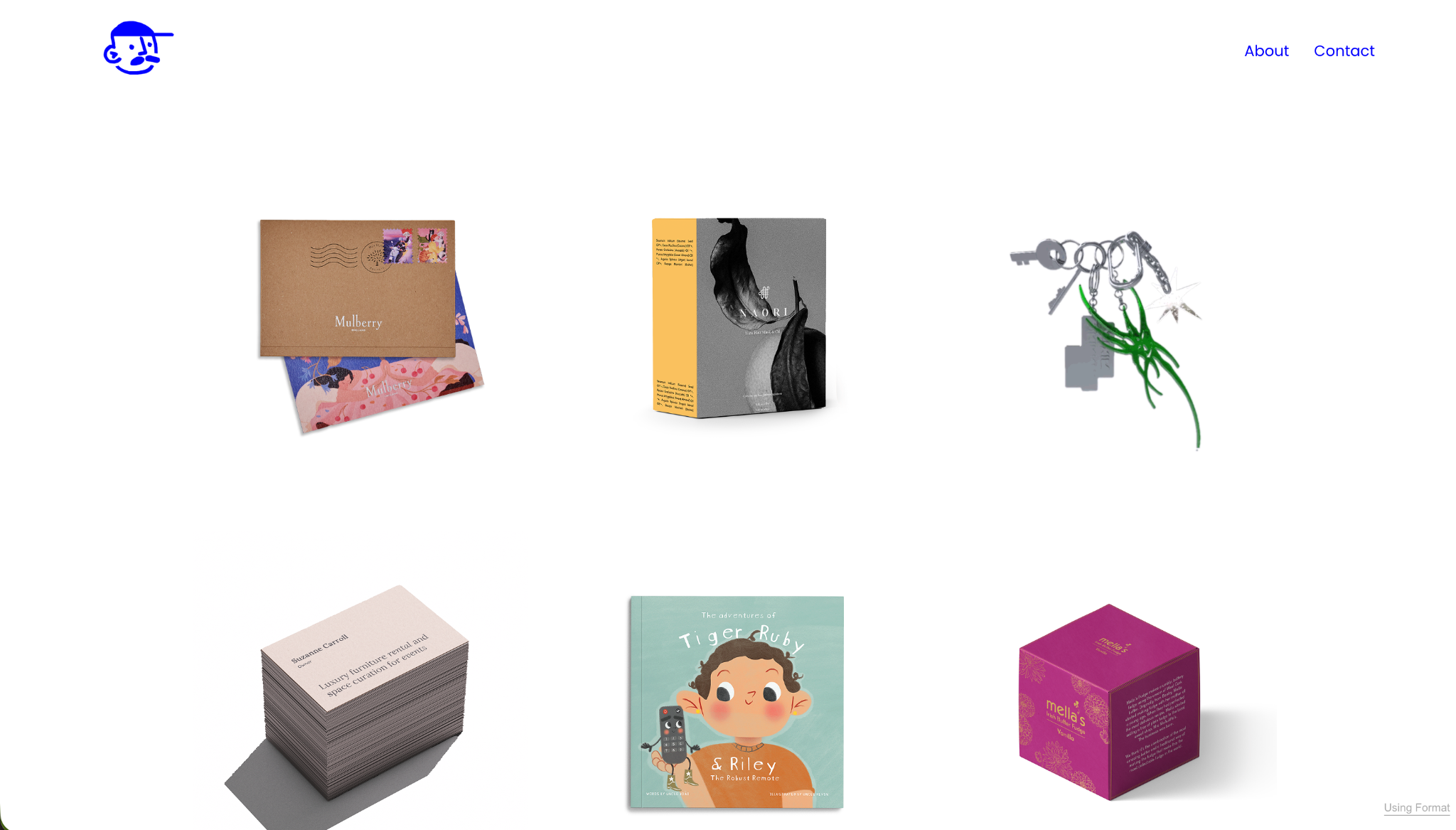 Portfolio of illustrated books, business cards, product packaging, and keychain design