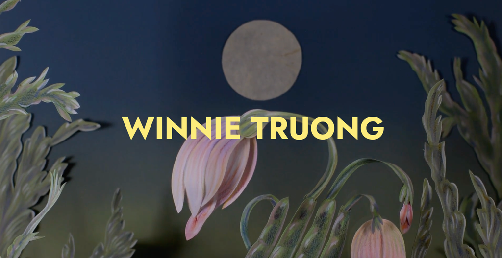 The name Winnie Truong is written in bold yellow letters across a stylized illustration of a drooping pink flower and green foliage set against a dark night sky with a full moon.