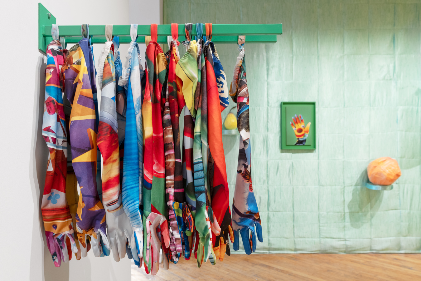 image of Gallery 44 exhibition featuring hand sewn glove installation by Hannah Doucet 1350px