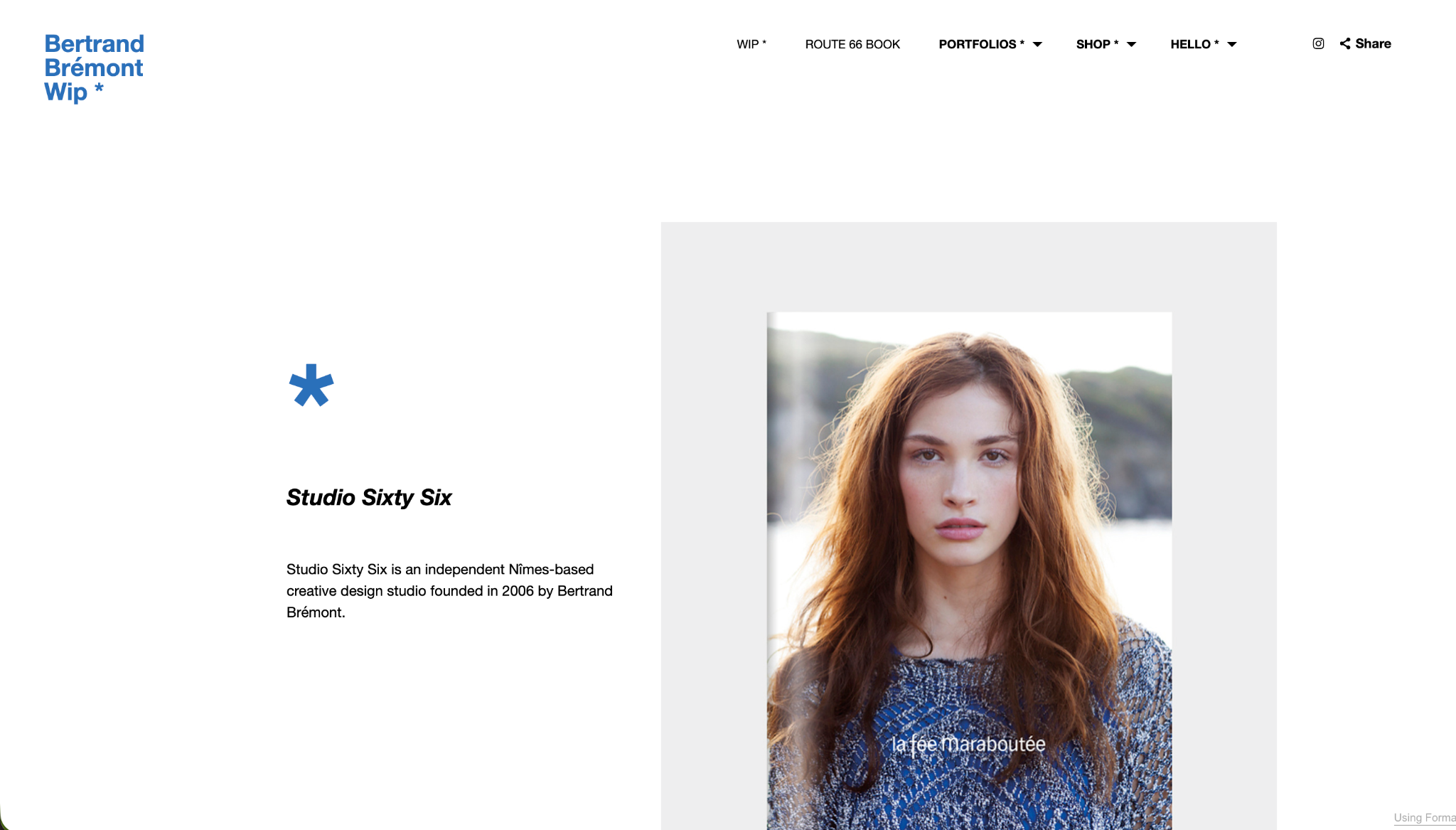 Red-haired model wearing a blue La Fée Maraboutée outfit