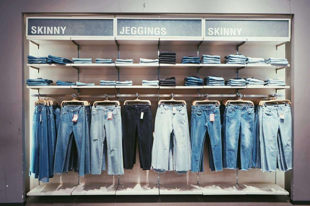 rack of different kinds of jeans