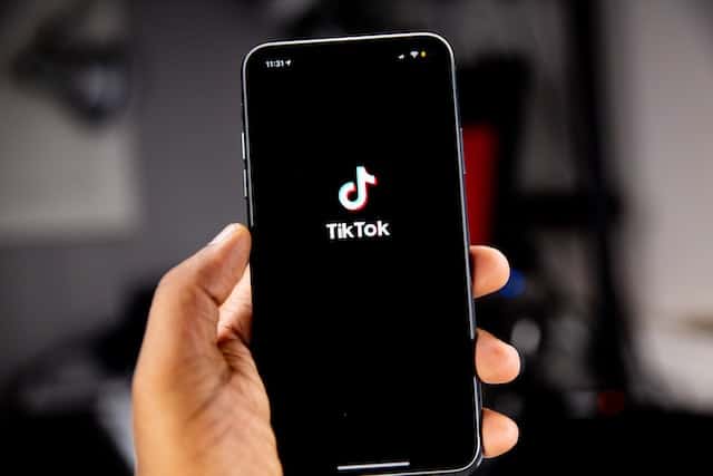 Cell phone screen showing the TikTok logo.